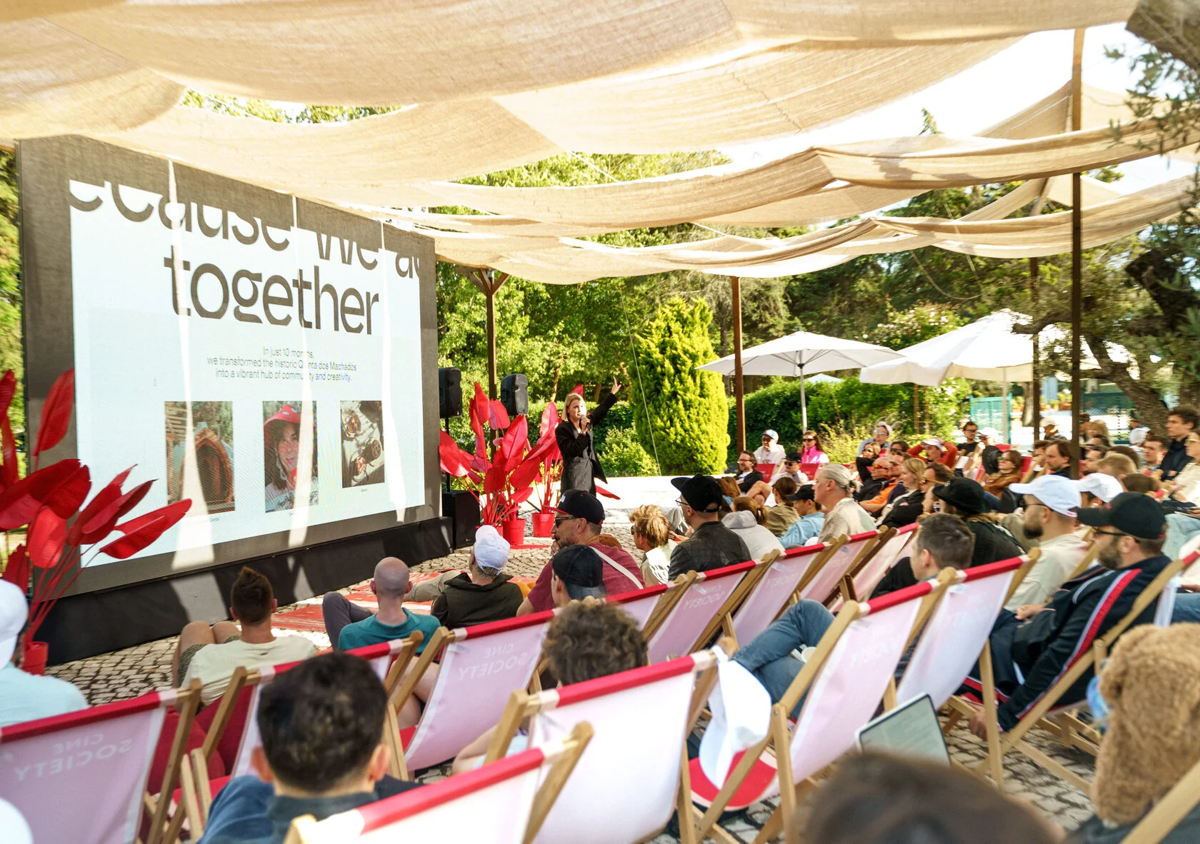Founders for Founders audience and speaker during an outdoor conference session at DOMA